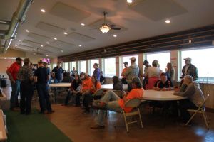 KIM & DOUG WYMAN PRESENTING AWARDS AT the 2017 October Corridor Clay Crushers tournament - 2nd Annual Pheasants Forever shootout hosting 9 collegiate trap teams at Otter Creek in Cedar Rapids Iowa