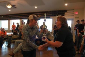 KIM & DOUG WYMAN PRESENTING AWARDS AT the 2017 October Corridor Clay Crushers tournament - 2nd Annual Pheasants Forever shootout hosting 9 collegiate trap teams at Otter Creek in Cedar Rapids Iowa