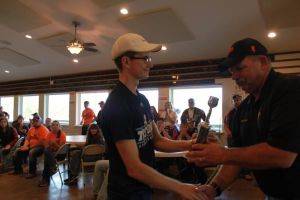 KIM & DOUG WYMAN PRESENTING AWARDS AT the 2017 October Corridor Clay Crushers tournament - 2nd Annual Pheasants Forever shootout hosting 9 collegiate trap teams at Otter Creek in Cedar Rapids Iowa